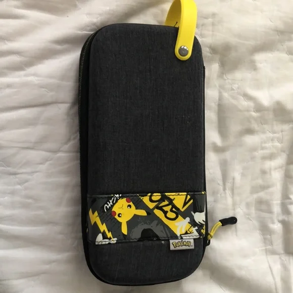 Nintendo Switch Lite with 3 games, 3 characters for Animal Crossing, and case.